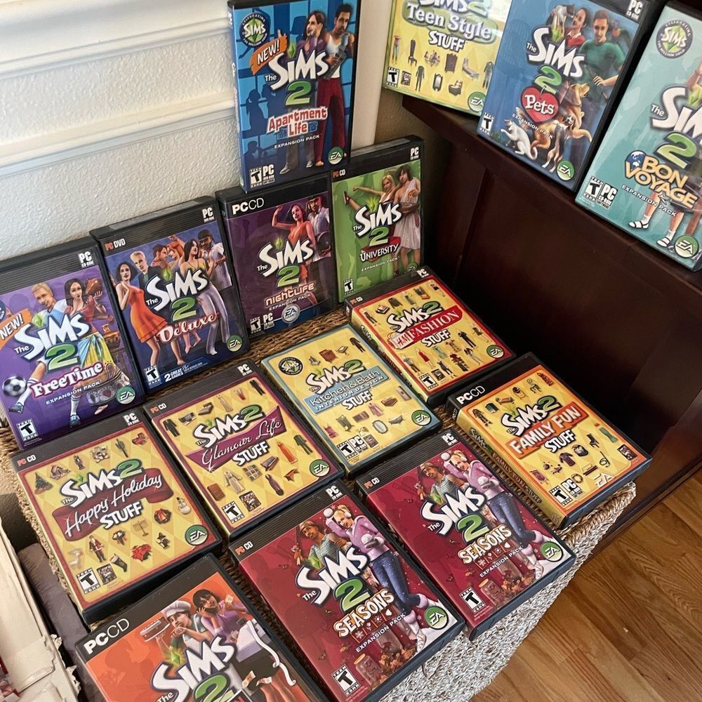 The SIMS PlayStation Vintage Side Video Game Lot PC DVD Pets Family Delux Sets